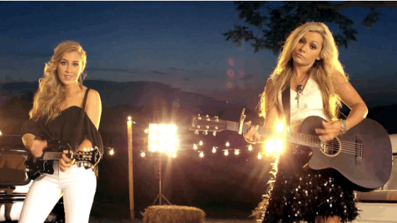 Maddie and Tae playing guitar